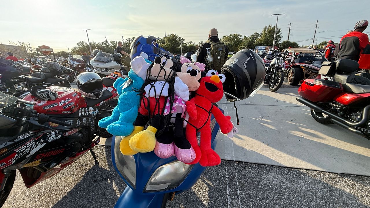 Toys strapped to the back of a motorcycle at Bert’s Barracuda Harley-Davidson's annual motorcycle toy run. (Spectrum News/Tyler O'Neill)