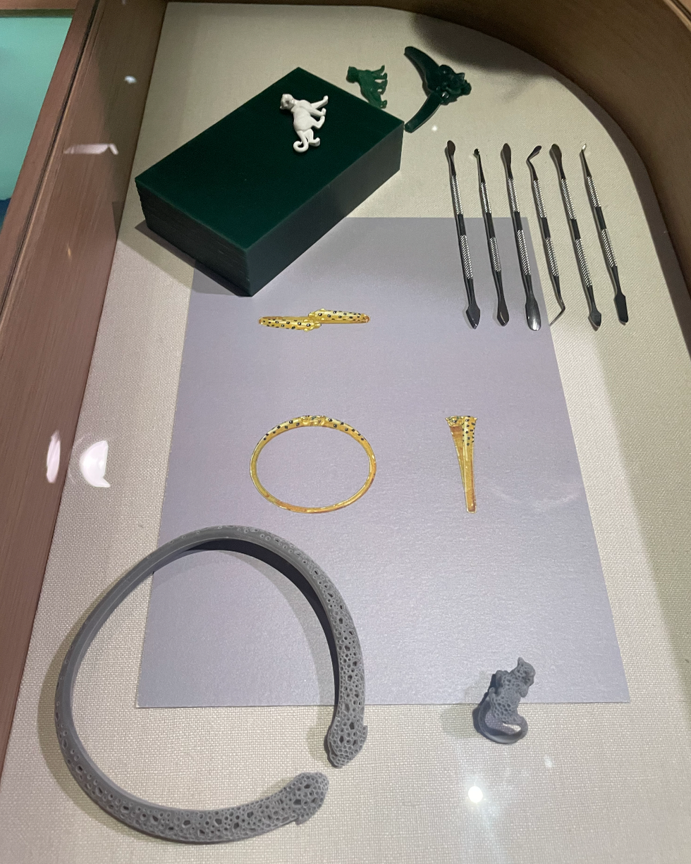 display of decorative items and tools including jewelry and a box