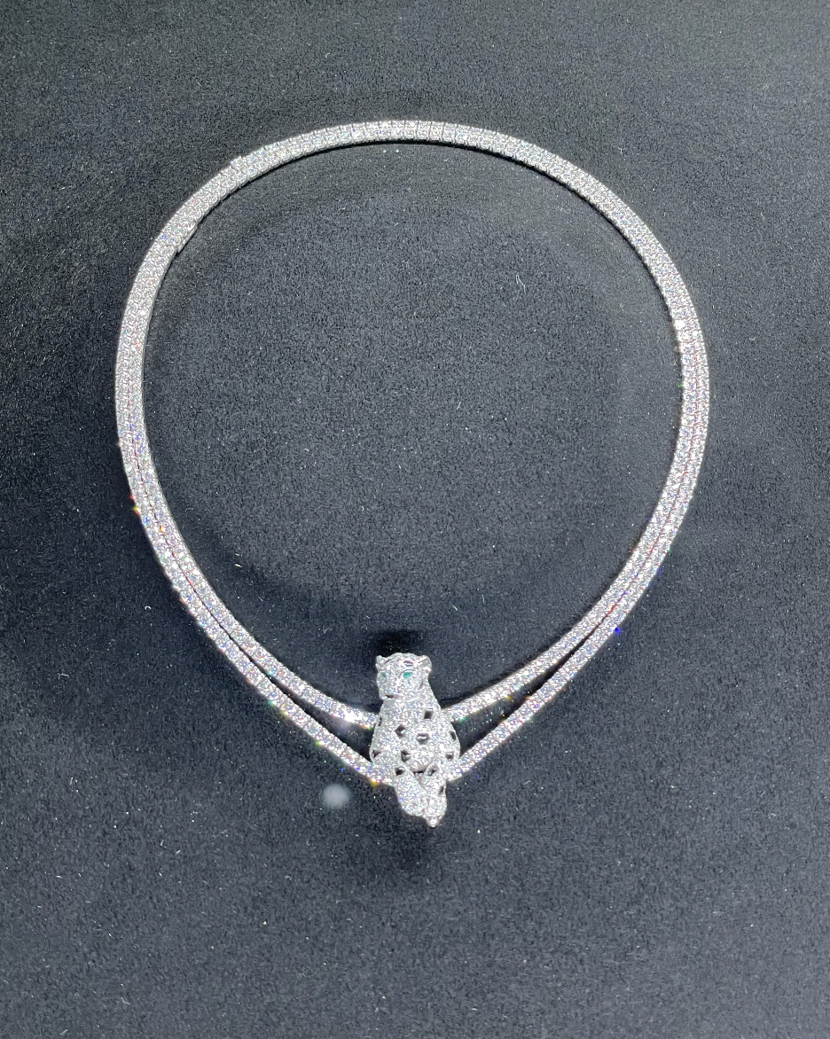 elegant gemstone necklace featuring a decorative pendant