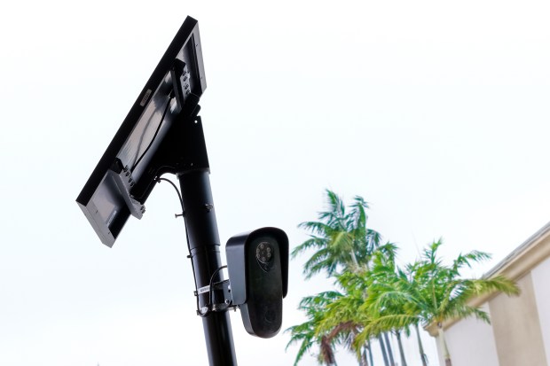 An automated license plate reader that appears to be a Flock Safety camera is shown on Northeast Fourth Avenue in Fort Lauderdale on Wednesday, Dec. 3, 2025. (Amy Beth Bennett / South Florida Sun Sentinel)