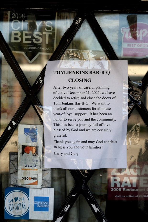 The sign on the door says it all. Tom Jenkins Bar-B-Que on U.S.1 in Fort Lauderdale is closing it's doors on December 21st. (Mike Stocker/South Florida Sun Sentinel)