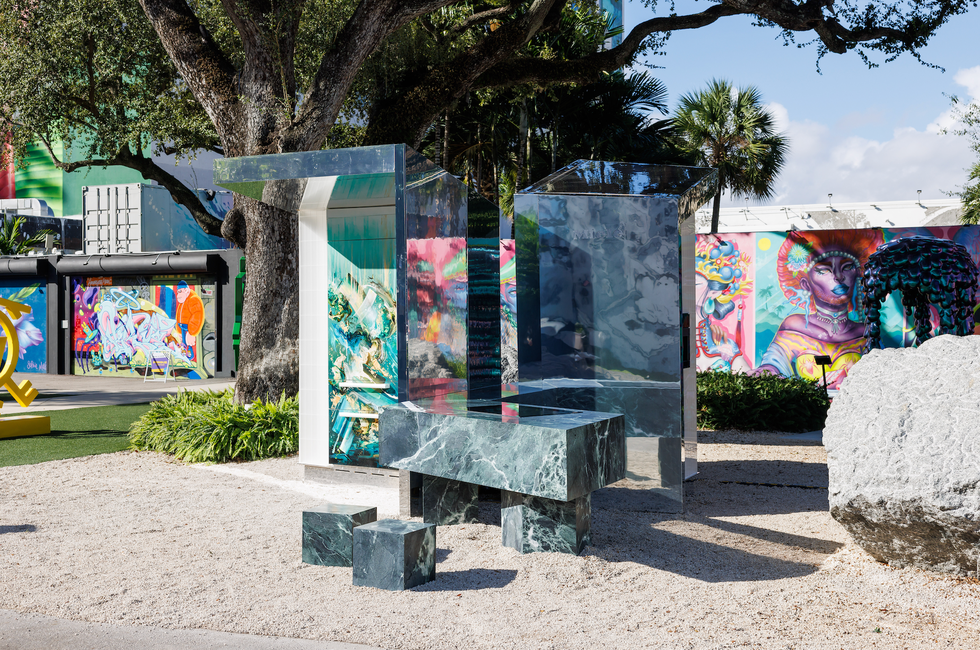 reflective sculptures in an outdoor urban art setting reflective sculptures in an outdoor urban art setting