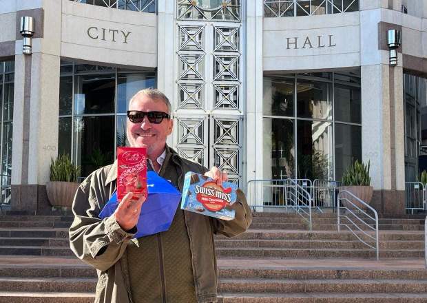 Orlando Mayor Buddy Dyer opens a drone grocery delivery outside City Hall on Tuesday, December 16, 2025 (Michael Cuglietta/Orlando Sentinel) 
