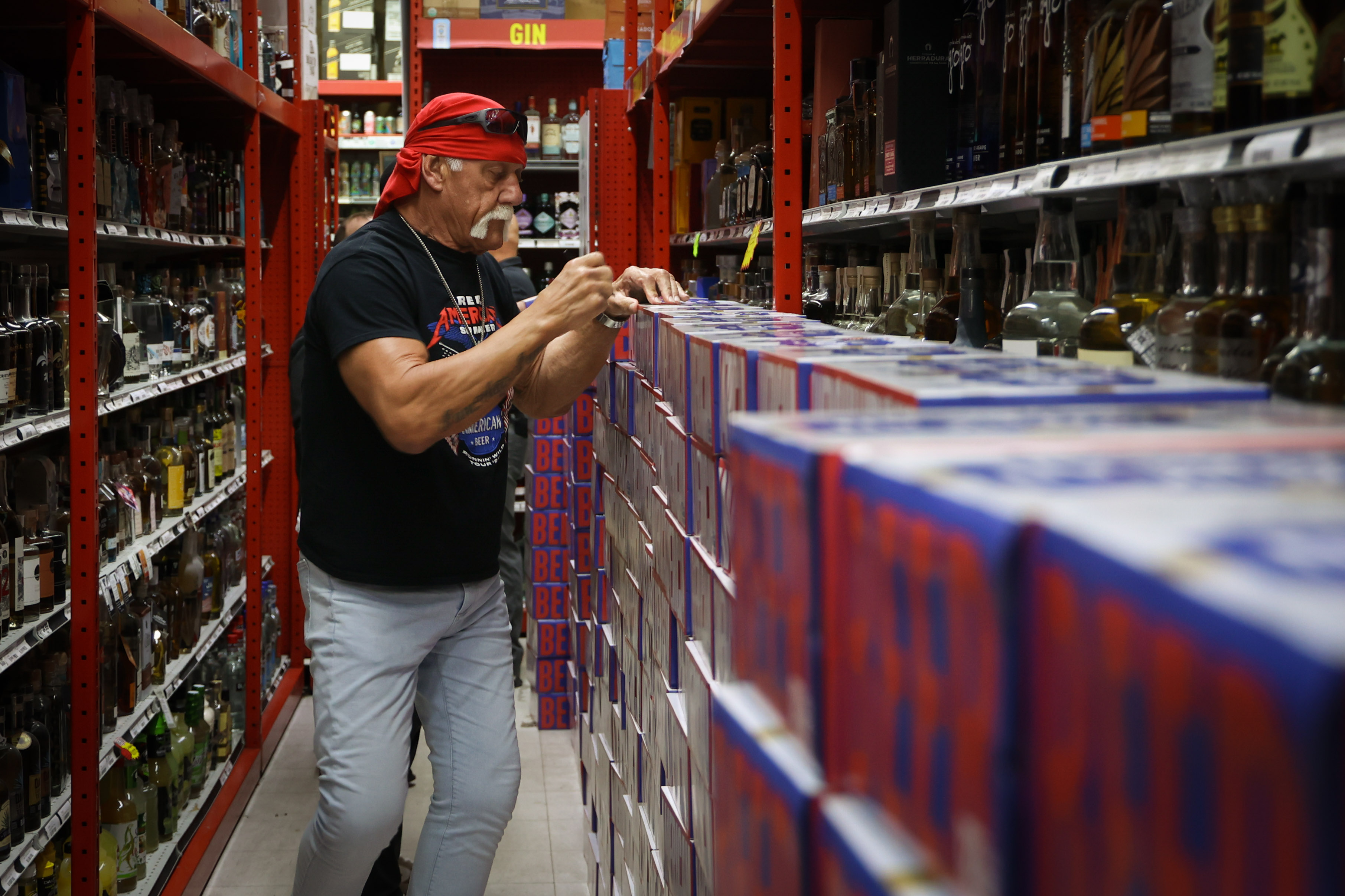 Wrestling legend Hulk Hogan signs cases of his Real American...