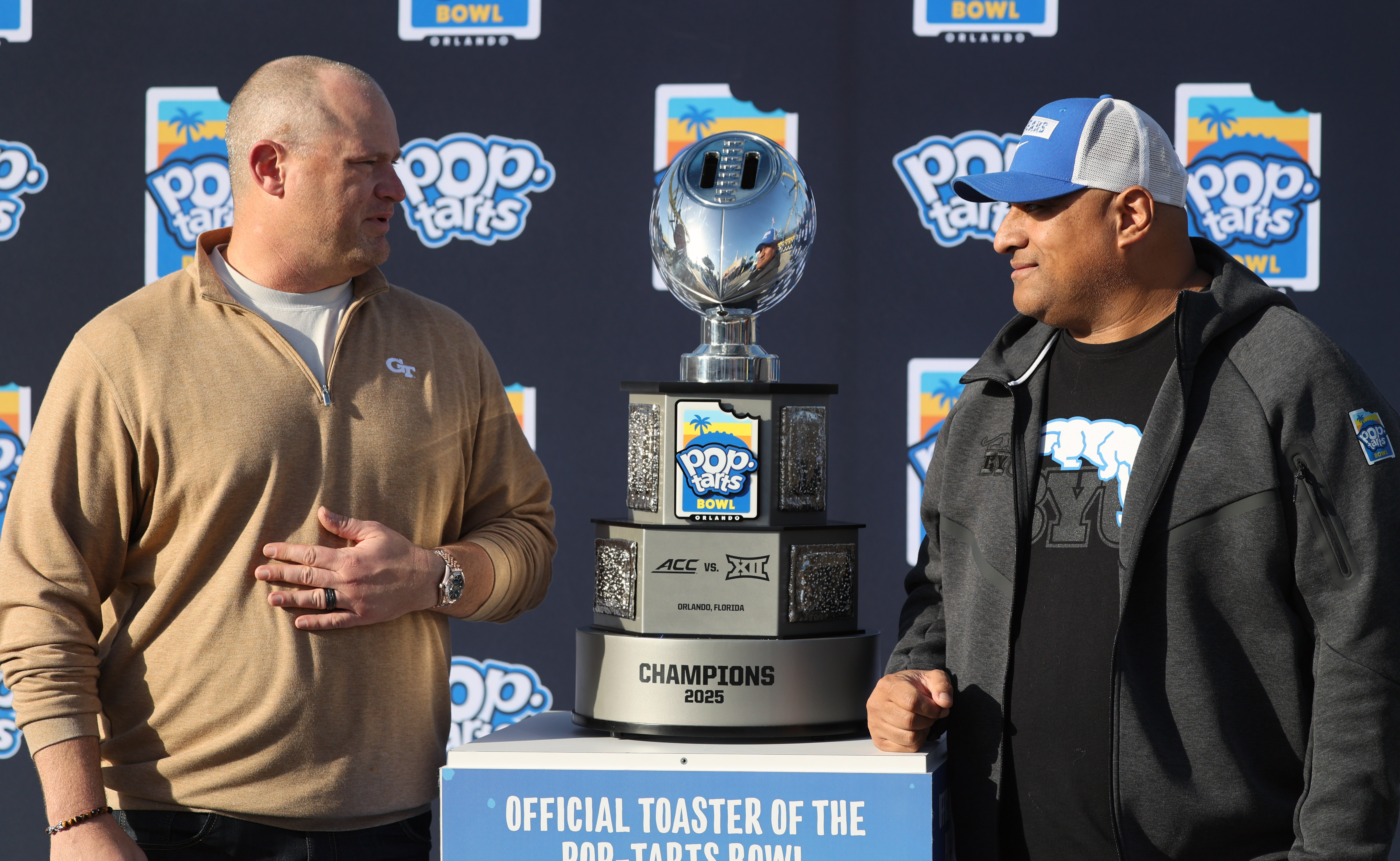 Left to Right, Georgia Tech football head coach Brent Key...