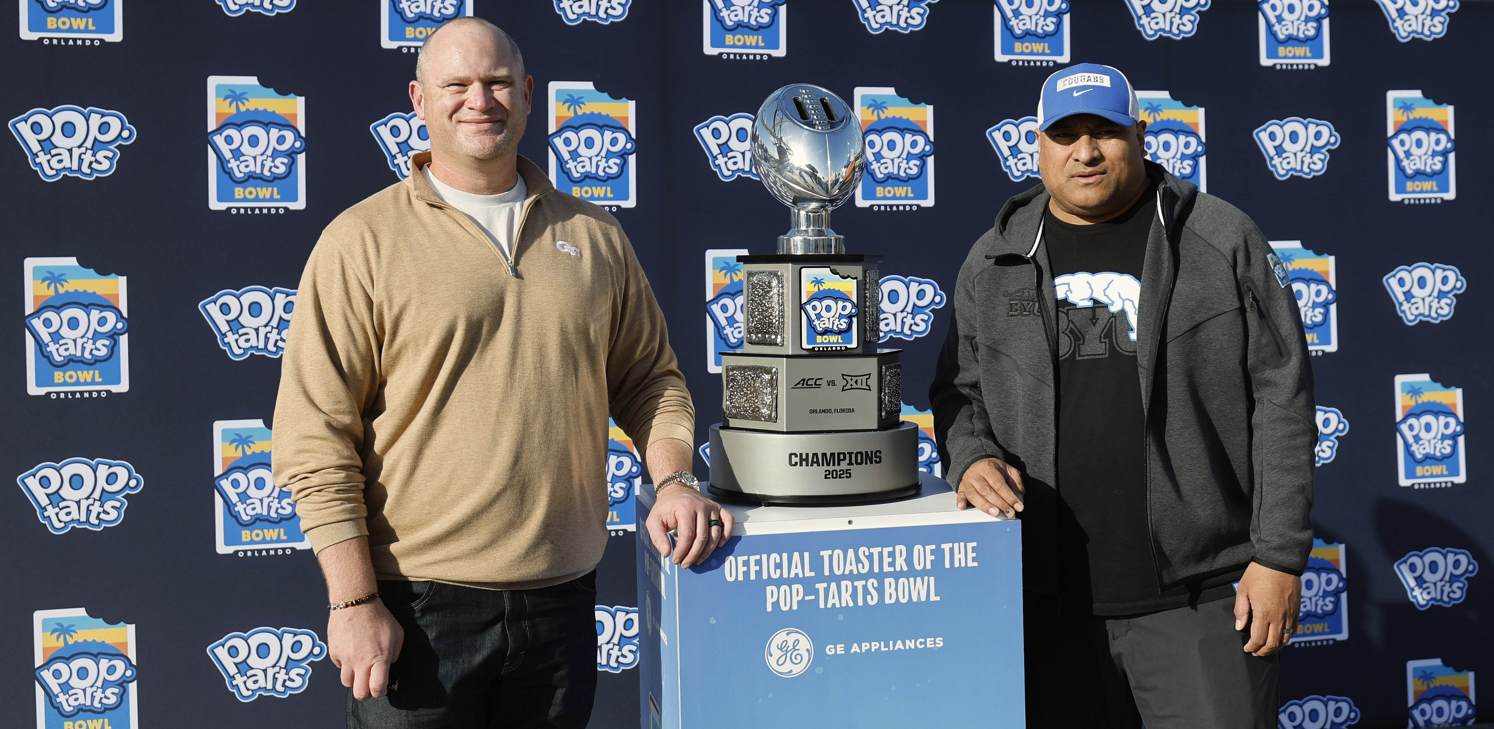 Left to Right, Georgia Tech football head coach Brent Key...