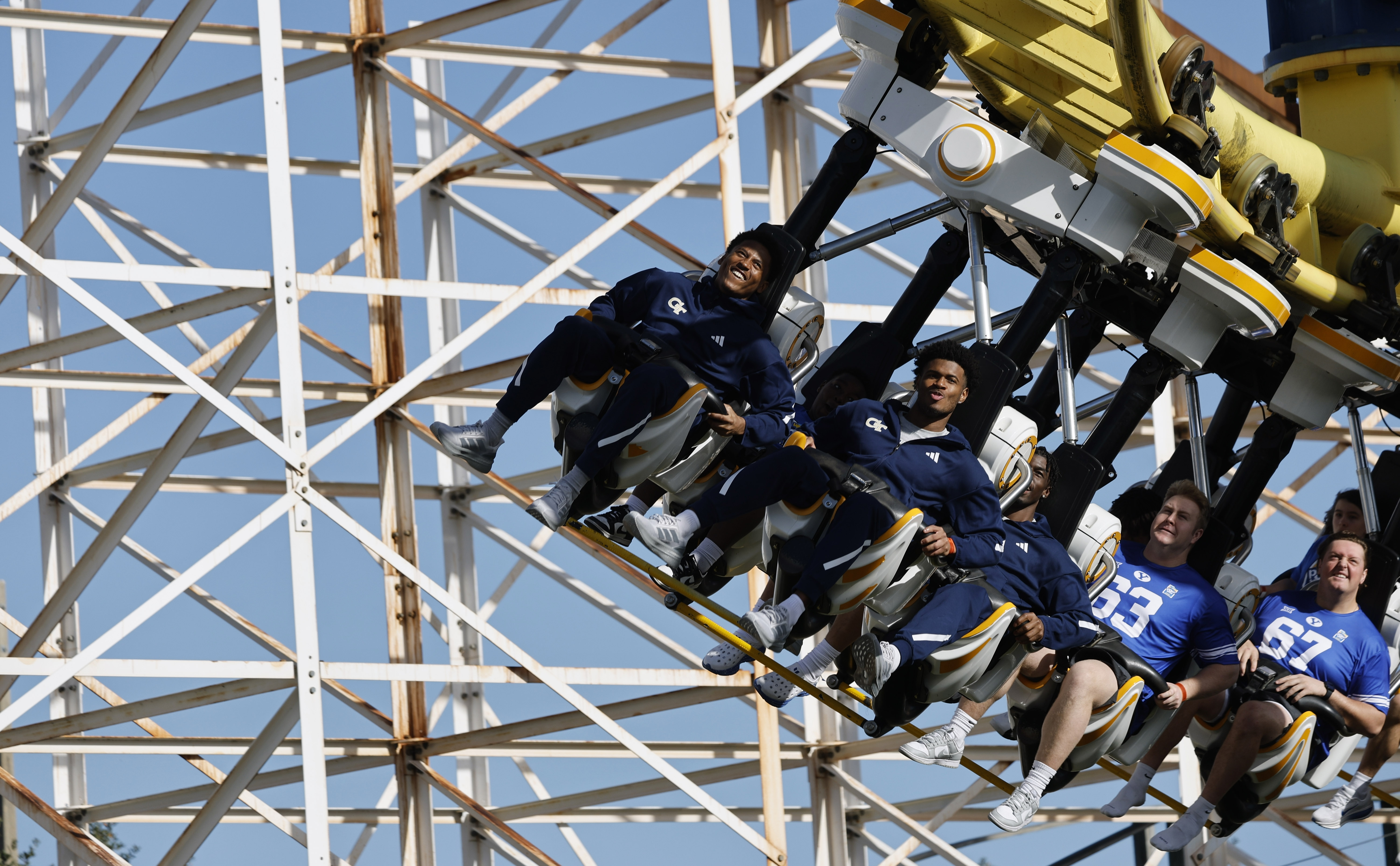 Football players and central Florida children ride the Freedom Flyer...