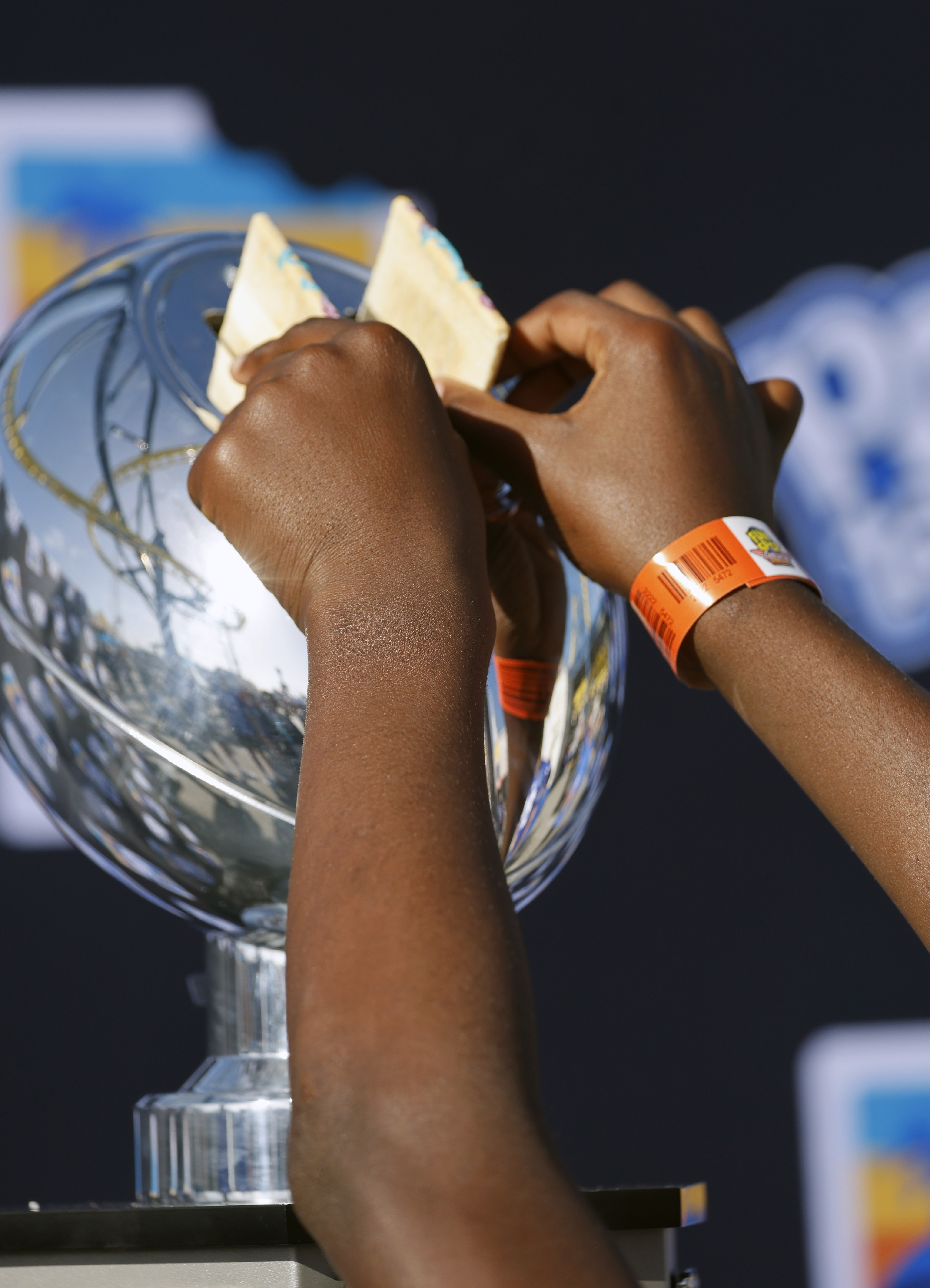A child tries out the toaster in the Pop-Tarts Bowl...