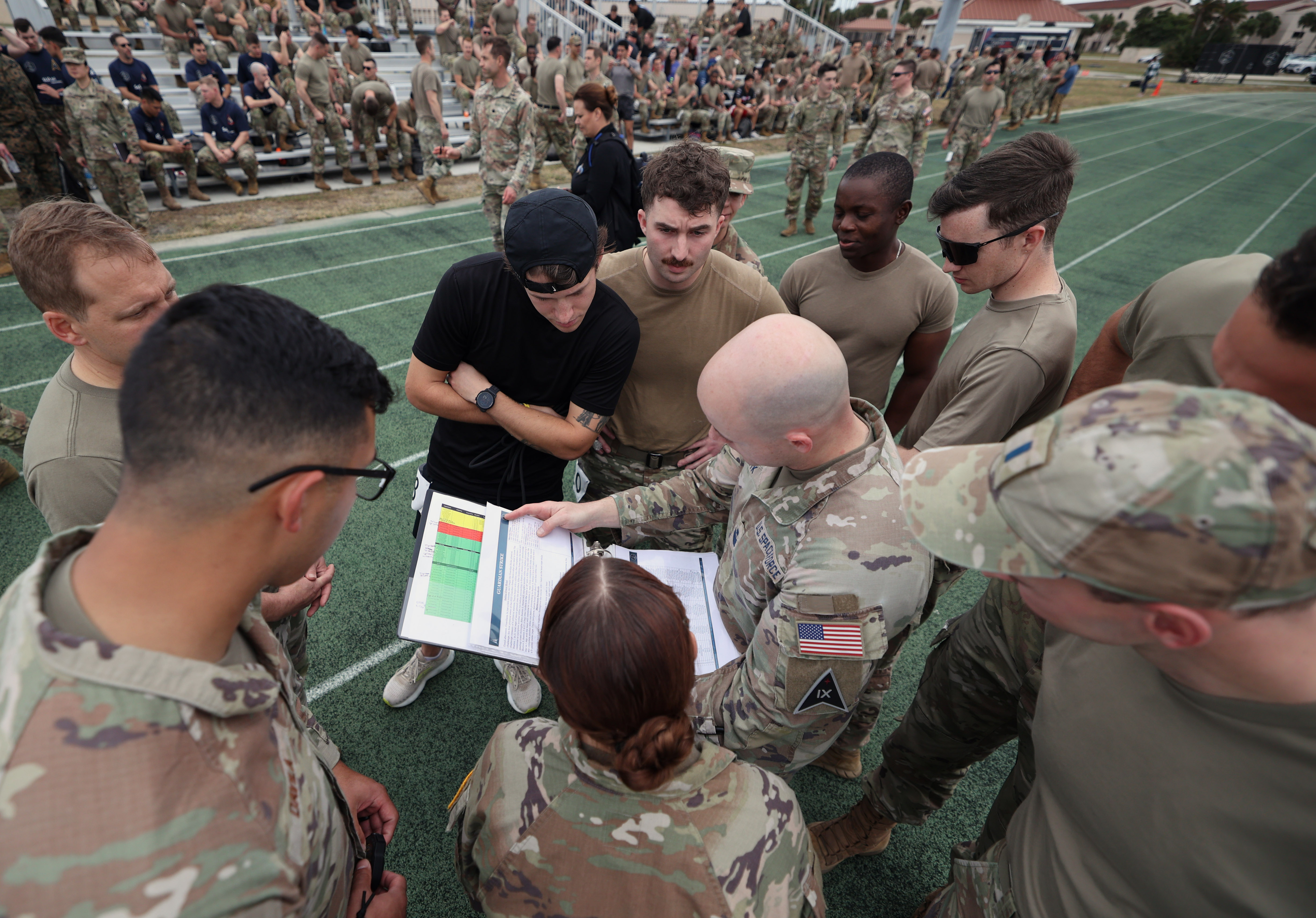 Participants look for their team start times during the first...
