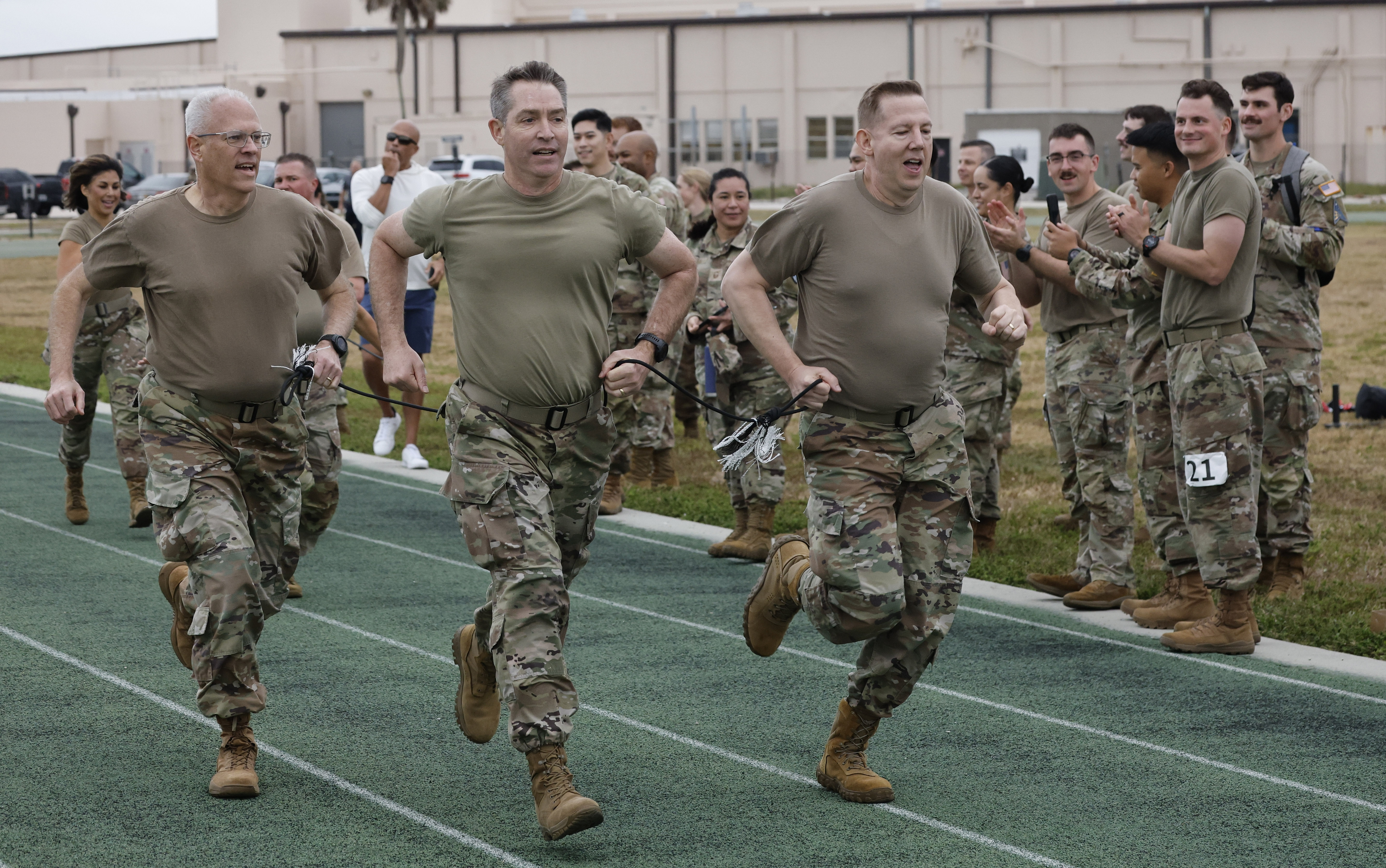 A group of senior Space Force officers run a lap...