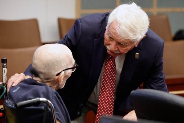 Tommy Zeigler speaks with defense attorney Terry Hadley before an...