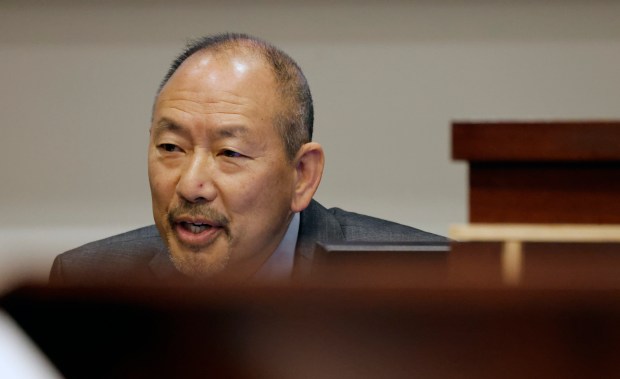 Forensic Scientist Kenton Wong on the witness stand during an...