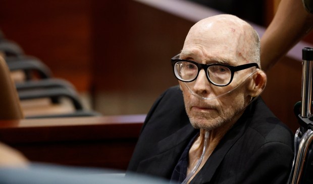 William Thomas "Tommy" Zeigler is taken out in a wheelchair...