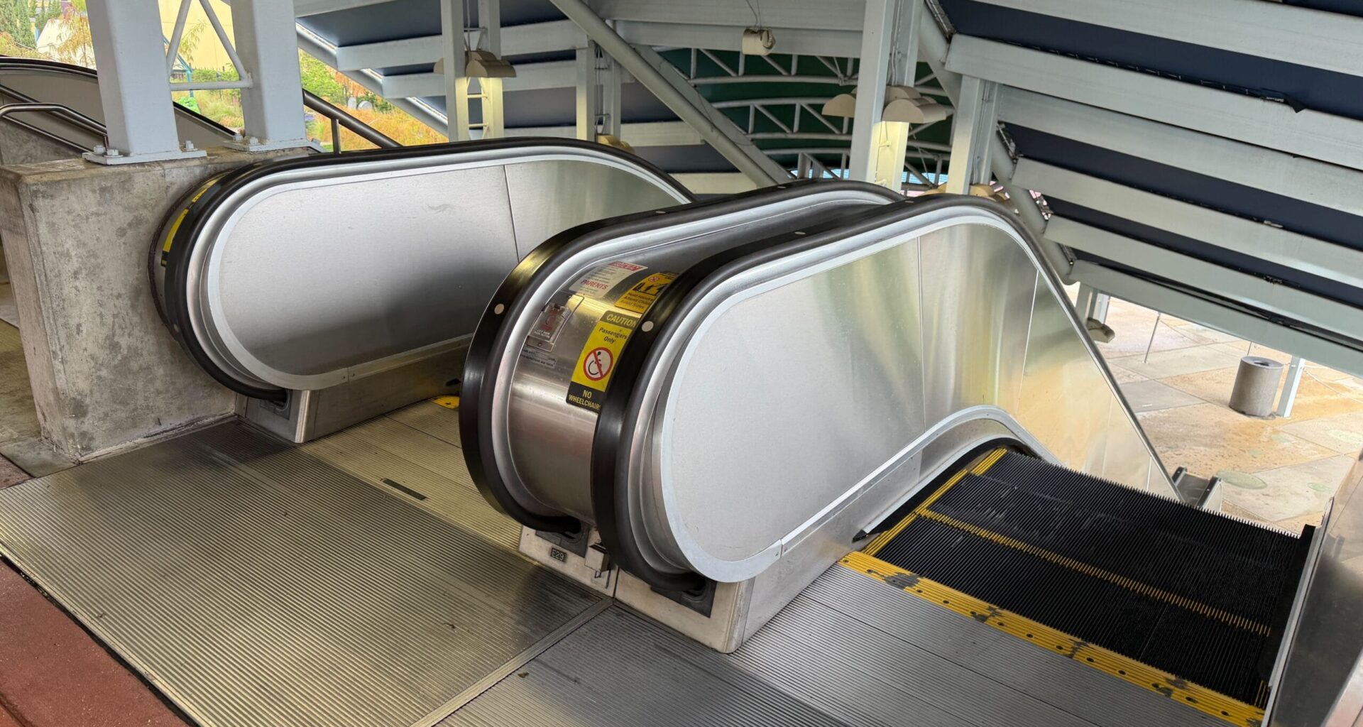 Temporary construction walls blocked a pair of escalators leading to and from the valet parking area at Universal Orlando