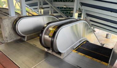 Temporary construction walls blocked a pair of escalators leading to and from the valet parking area at Universal Orlando