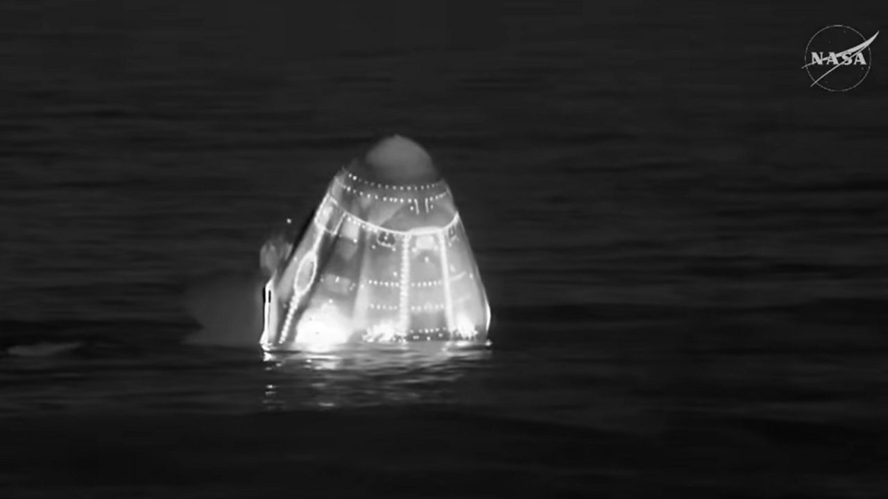 The SpaceX Dragon capsule for NASA's Crew-11 mission is seen in the water off the coast of California Thursday morning after the crew was forced to return early from the International Space Station because of a medical issue. (NASA)
