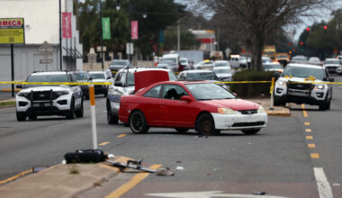 Two dead, two police officers shot after morning shootout in city streets