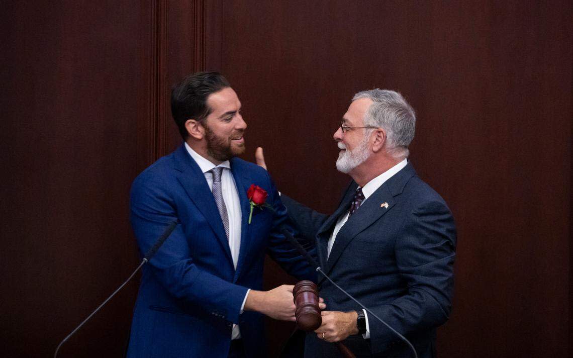 Florida House Speaker Daniel Perez, R-Miami, hands Florida Senate President Ben Albritton, R-Wauchula, the gavel during the first day of the legislative session at the Florida State Capitol on Tuesday, March 4, 2025, in Tallahassee, Fla.
