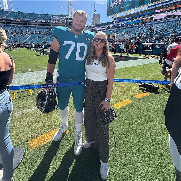 The guard, pictured with wife Sam, signed a three-year deal that includes $32.5m guaranteed