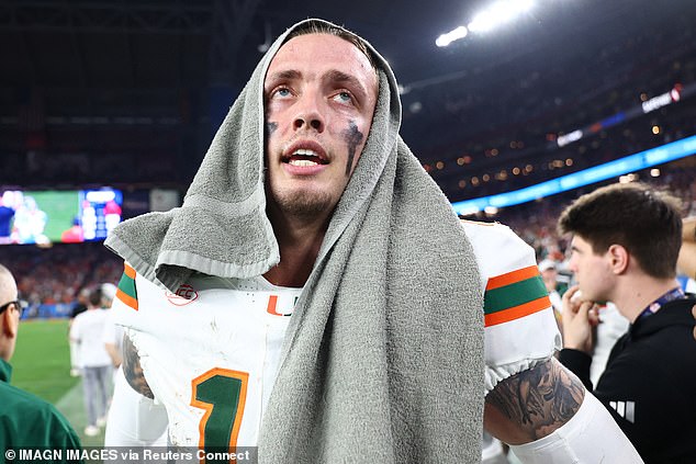 Miami Hurricanes quarterback Carson Beck (11) reacts after winning the 2026 Fiesta Bowl