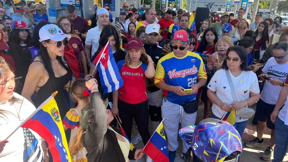 Crowds celebrate at a gas station in Doral, Florida, Saturday after Venezuela president's capture - CNN