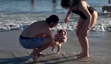 6-week-old baby dips her toes in water for Polar Plunge at Jacksonville Beach