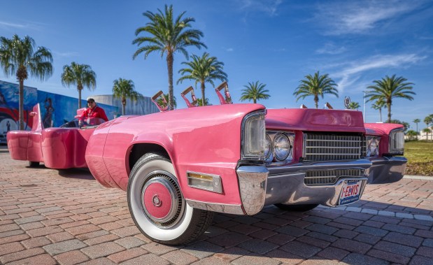 Mechanic Orlando Nuñez in the cockpit of the restored guitar-shaped car that belonged to Elvis Presley, that is on display in the Orlando Auto Museum at Dezerland Park, on Thursday, January 8, 2026. (Ricardo Ramirez Buxeda/Orlando Sentinel)