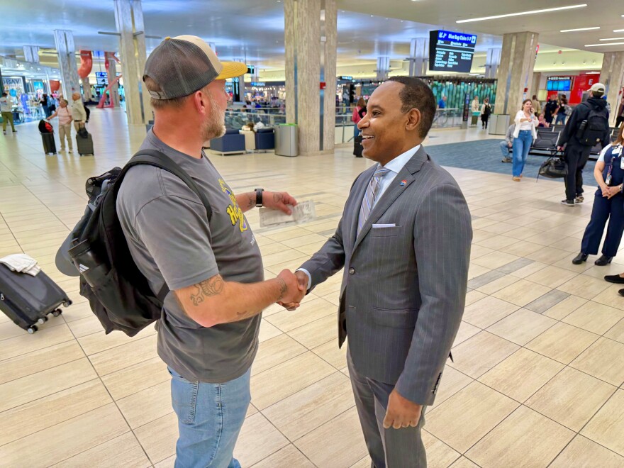 Tampa International Airport CEO Michael Stephens speaks with a passenger on his first week on the job in April 2025.