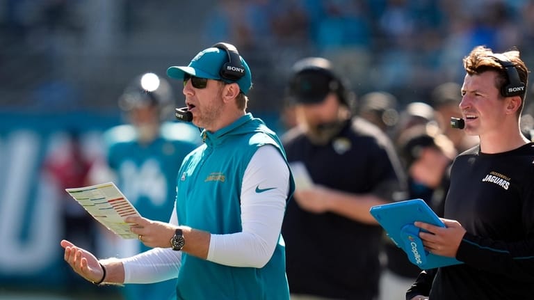 Jacksonville Jaguars head coach Liam Coen looks on during the...
