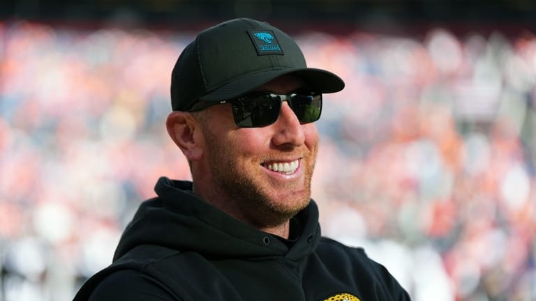 Jacksonville Jaguars head coach Liam Coen looks on before an...