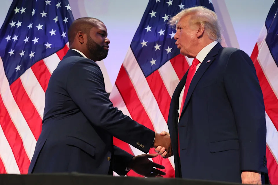 Rep. Byron Donalds (R-FL) shakes hands with former U.S. President Donald Trump during the Moms for Liberty Joyful Warriors national summit at the Philadelphia Marriott Downtown on June 30, 2023 in Philadelphia, Pennsylvania.