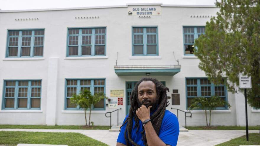 Emmanuel George, the curator of the Old Dillard Museum, is photographed outside of the historic building in the Sistrunk neighborhood on Wednesday, July 10, 2024, in Fort Lauderdale, Fla. George curated the latest exhibit “Sistrunk, Then & Now” to show how the Black neighborhood has changed over the decades.