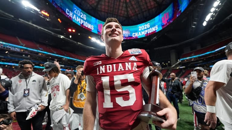Indiana quarterback Fernando Mendoza (15) celebrates after the Peach Bowl...