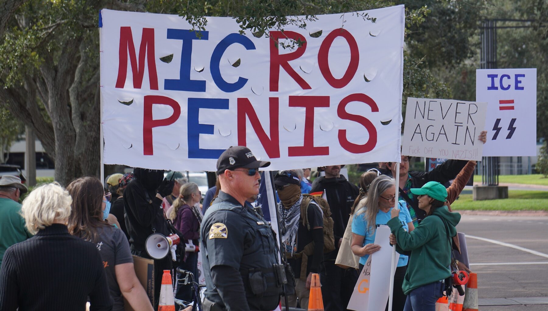 Photos: Protestors picket Border Patrol recruitment at St. Pete Carillon Hilton