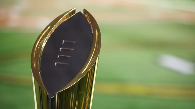 The College Football Playoff National Championship Trophy is shown before...