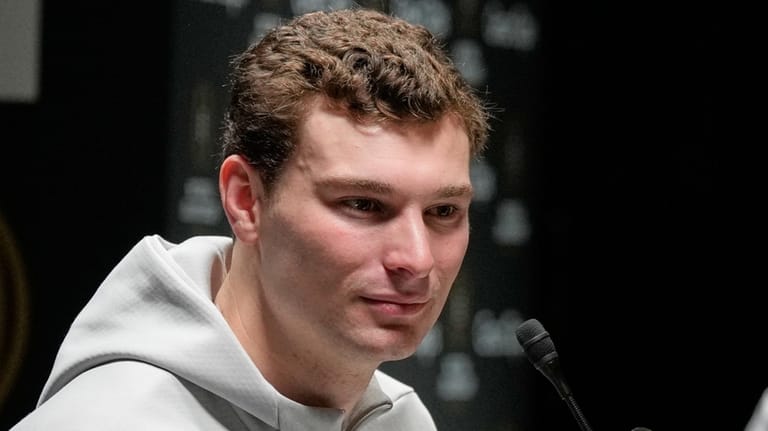 Indiana quarterback Fernando Mendoza speaks during media day ahead of...