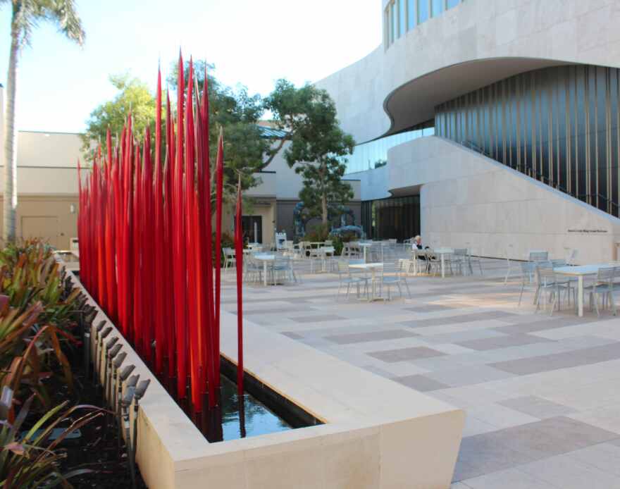 Jillian Mayer's 'Pergola Spolia' and Slumpies pictured at far end of Norris Garden beyond Dale Chihuly's 'Red Reeds.'