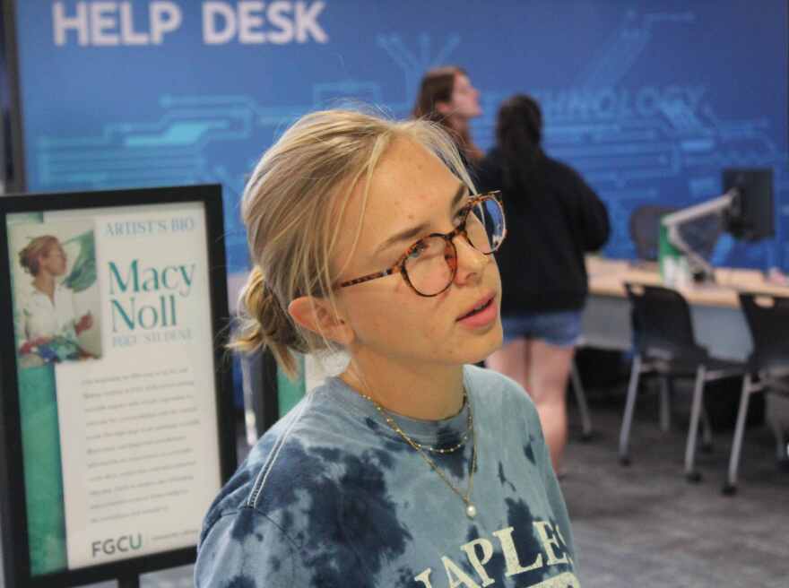 Fifth year FGCU student and 'Knowledge in Motion' muralist Macy Noll prefers murals over other forms of visual art.