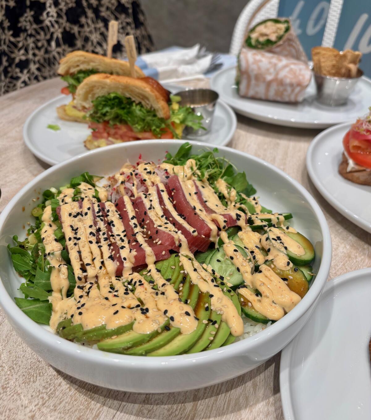 Pura Vida Miami at South Coast Plaza offers wraps, sandwiches and bowls like a spicy tuna bowl.