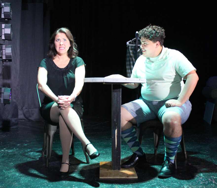 Lisa Kuchinski and Ethan MacKay in scene from 'I Love You, You're Perfect, Now Change'