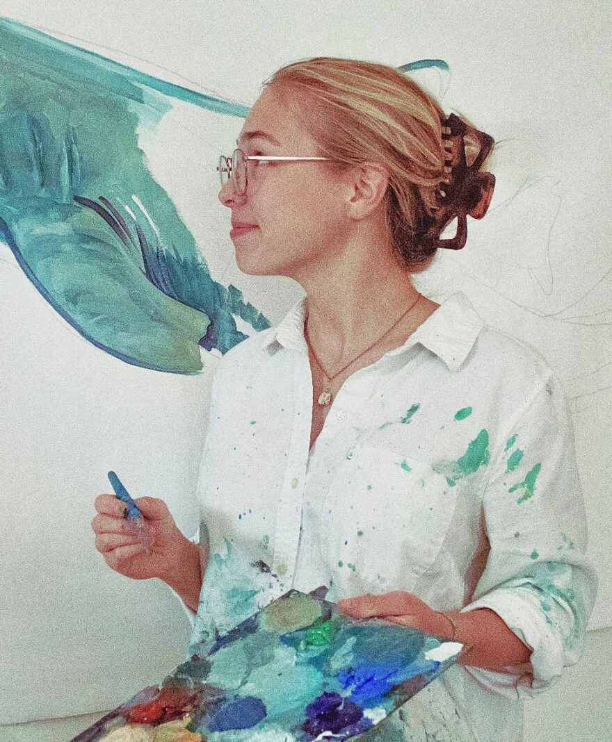 Fifth year FGCU art and biology major and muralist Macy Noll.