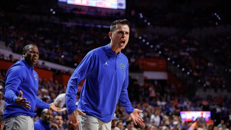 Florida Gators head coach Todd Golden shouts form the sidelines...
