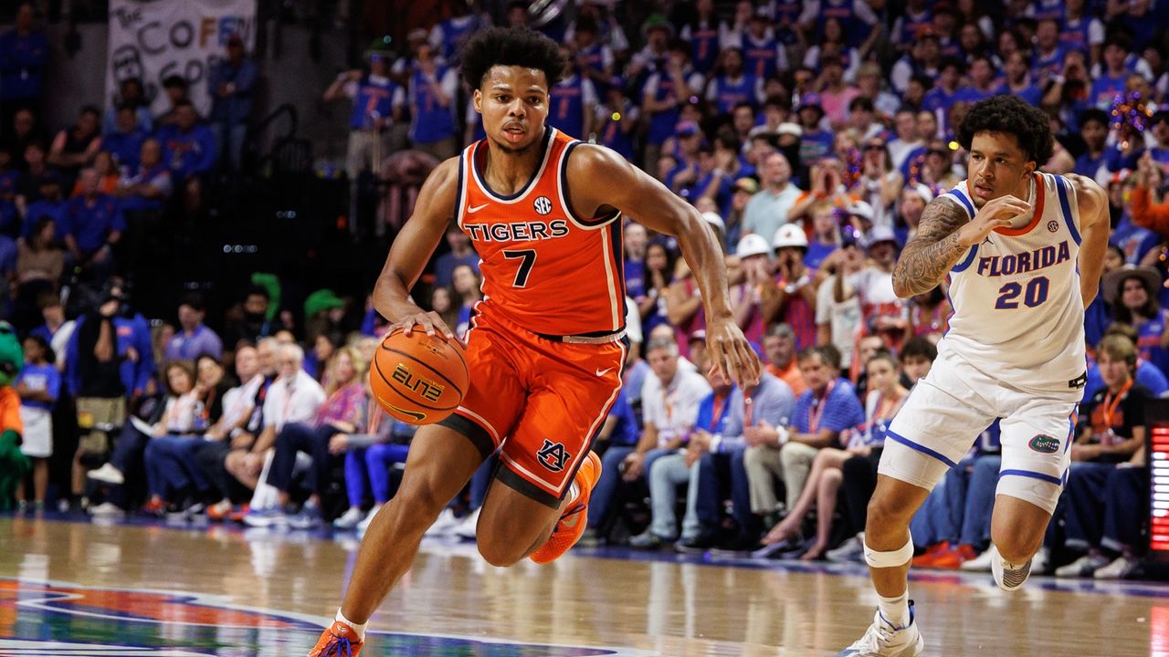 Hall has 24 points as Auburn beats No. 16 Florida 76-67 for first win in Gainesville since 1996