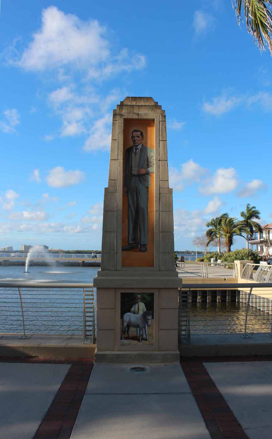 Mural of Harvie Heitman on obelisk on north side of Edwards Ave.