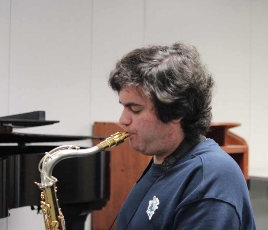 FGCU student Jonathan Esyaman on saxophone.