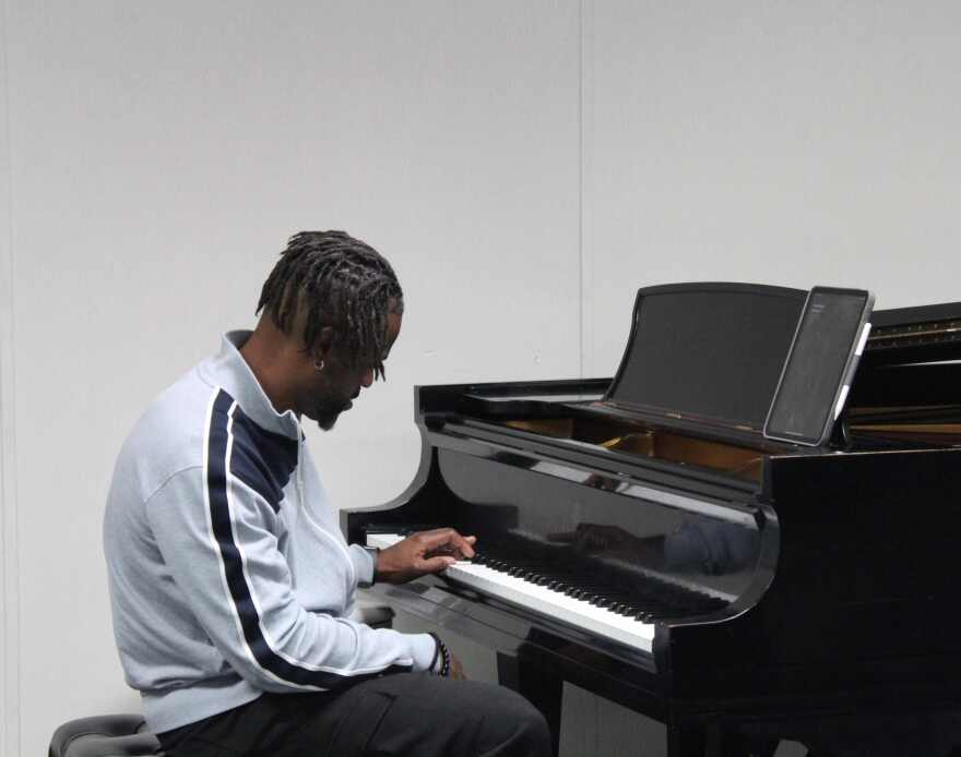 FGCU music instructor Brandon Robertson on piano during rehearsal with Jazz Combo.
