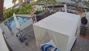 Couple caught on camera lurking in Florida family's backyard