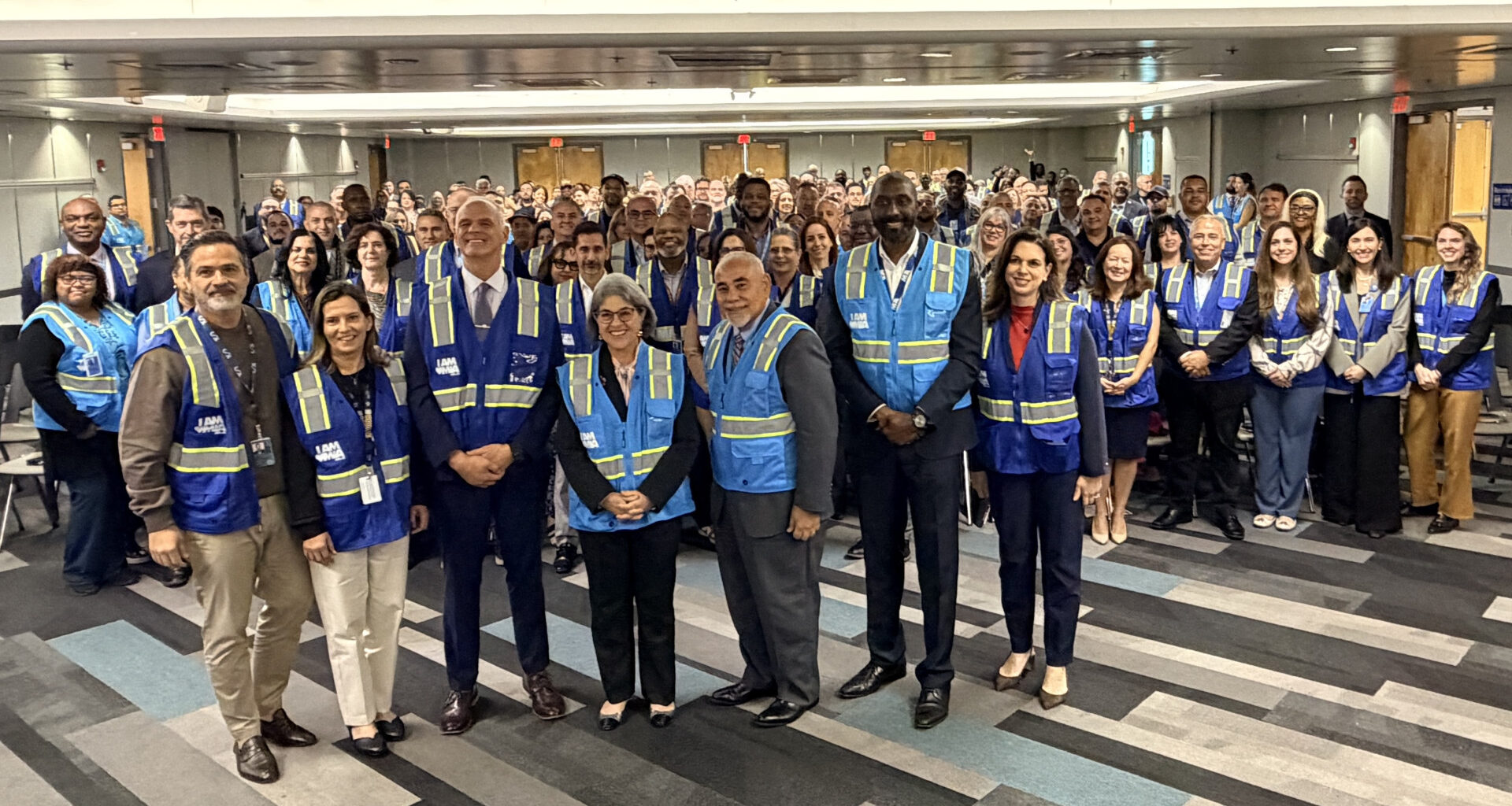 Miami-Dade County Mayor huddles with MIA employees to kick off blockbuster travel year for local events
