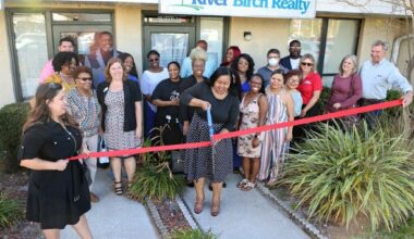 River Birch Realty owner Katrina Leek Robinson cut the ribbon on the firm