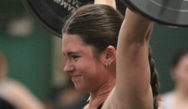 Fleming Island girls weightlifter and state medalist Kathryn Ward smiles for a good lift as she is one of two area lifters that won gold at the prestigious Power of Christmas Weightlifting Invitational at Suwannee High. Fleming Island, the defending Olympics state champion, finished fourth.